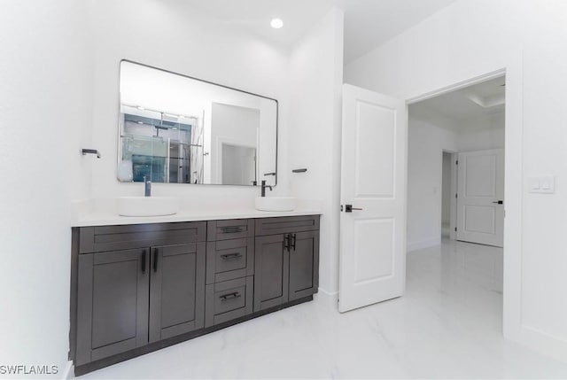 615 Greenbriar Blvd, Lehigh Acres, FL 33972 - full bathroom featuring double vanity, marble look tile flooring, and a shower