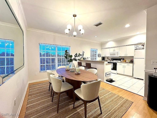 1868 Dogwood Dr, Marco Island, FL 34145 - dining area with light wood-type flooring, crown molding, a chandelier, and recessed lighting