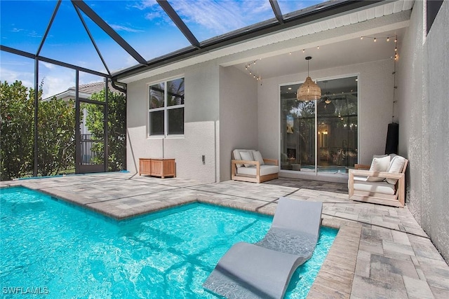 14671 Edgewater Cir, Naples, FL 34114 - swimming pool with a patio area and glass enclosure