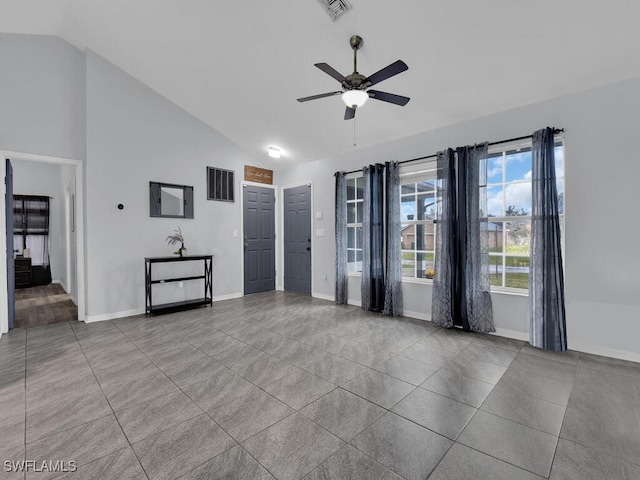 515 SW 9th Ct, Cape Coral, FL 33991 - unfurnished living room featuring a ceiling fan, high vaulted ceiling, and tile patterned floors