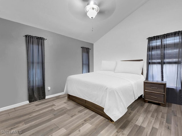 515 SW 9th Ct, Cape Coral, FL 33991 - bedroom with lofted ceiling, wood finished floors, and ceiling fan
