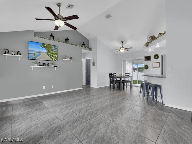 515 SW 9th Ct, Cape Coral, FL 33991 - living room featuring ceiling fan and high vaulted ceiling