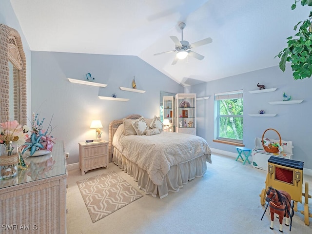 21950 N River Rd, Alva, FL 33920 - bedroom with lofted ceiling, carpet floors, and ceiling fan