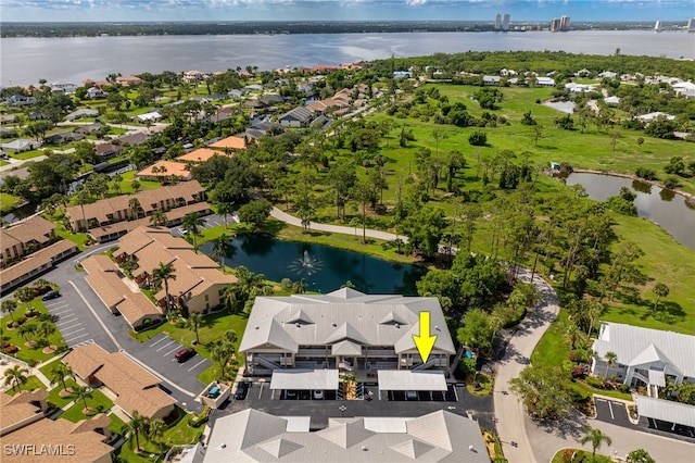 15250 Riverbend Blvd Unit 101, North Fort Myers, FL 33917 - aerial perspective of suburban area featuring a large body of water