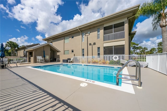 15250 Riverbend Blvd Unit 101, North Fort Myers, FL 33917 - community pool with a patio