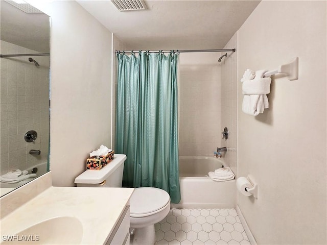 345 Mango St Unit 505, Fort Myers Beach, FL 33931 - bathroom featuring vanity, shower / tub combo, and tile patterned floors