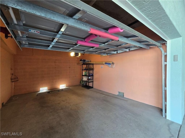 345 Mango St Unit 505, Fort Myers Beach, FL 33931 - garage with concrete block wall