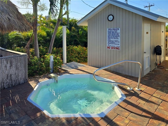 345 Mango St Unit 505, Fort Myers Beach, FL 33931 - view of pool featuring an outbuilding