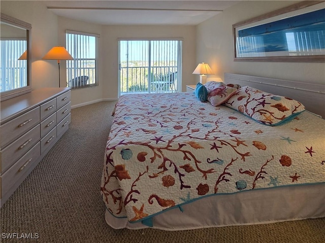 345 Mango St Unit 505, Fort Myers Beach, FL 33931 - bedroom featuring carpet and access to exterior