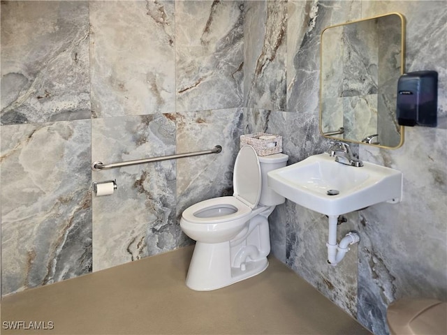 345 Mango St Unit 505, Fort Myers Beach, FL 33931 - bathroom with toilet and tile walls