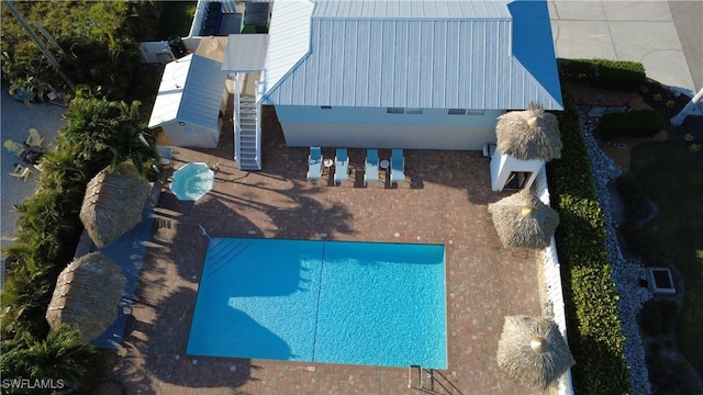 345 Mango St Unit 505, Fort Myers Beach, FL 33931 - view of subject property featuring a pool area