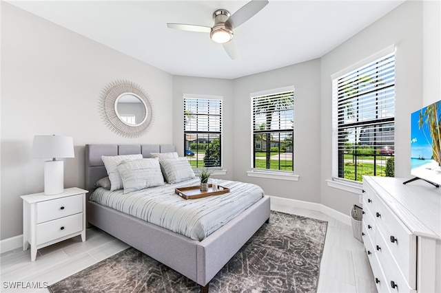 19604 Beechcrest Pl, Estero, FL 33928 - bedroom with baseboards and ceiling fan