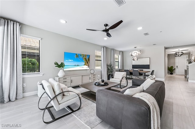 19604 Beechcrest Pl, Estero, FL 33928 - living area with a ceiling fan, recessed lighting, and a chandelier