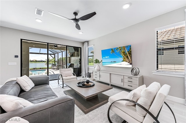 19604 Beechcrest Pl, Estero, FL 33928 - living area featuring a ceiling fan, recessed lighting, and a sunroom