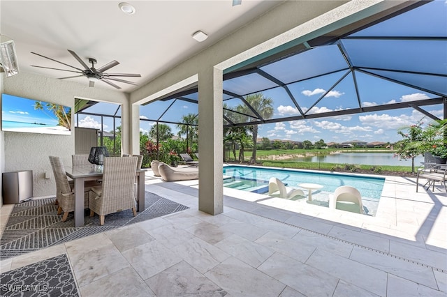 19604 Beechcrest Pl, Estero, FL 33928 - view of patio with a ceiling fan, an outdoor pool, a water view, outdoor dining area, and a lanai