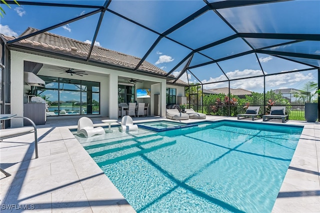 19604 Beechcrest Pl, Estero, FL 33928 - view of pool featuring a patio, ceiling fan, a pool with connected hot tub, and glass enclosure