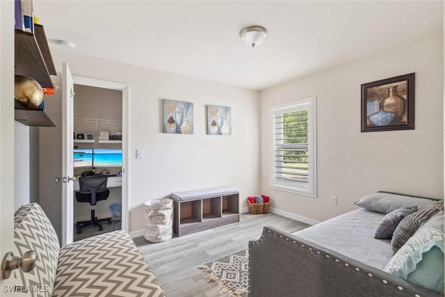 9059 Aegean Cir, Lehigh Acres, FL 33936 - bedroom with a desk and wood finished floors