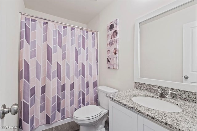 9059 Aegean Cir, Lehigh Acres, FL 33936 - bathroom with vanity, curtained shower, and wood finished floors