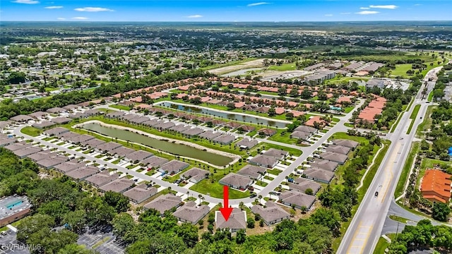 9059 Aegean Cir, Lehigh Acres, FL 33936 - aerial view of residential area featuring a large body of water