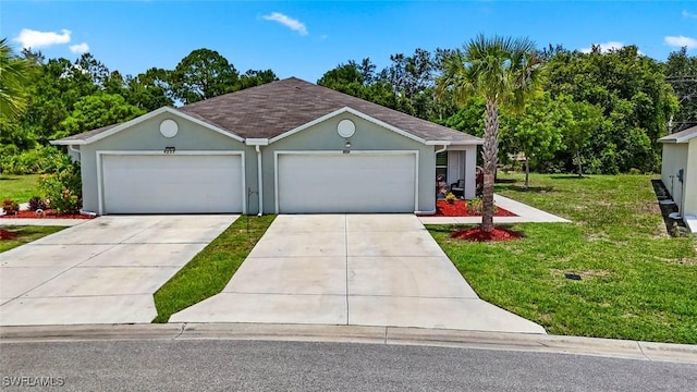 9059 Aegean Cir, Lehigh Acres, FL 33936 - view of front of house featuring a front yard, driveway, stucco siding, and roof with shingles
