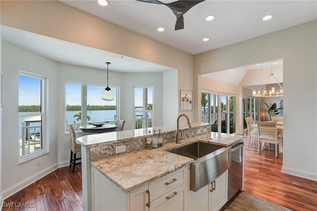 4031 Bayside Rd, Fort Myers Beach, FL 33931 - kitchen featuring dishwasher, dark wood-style floors, pendant lighting, a chandelier, and white cabinets