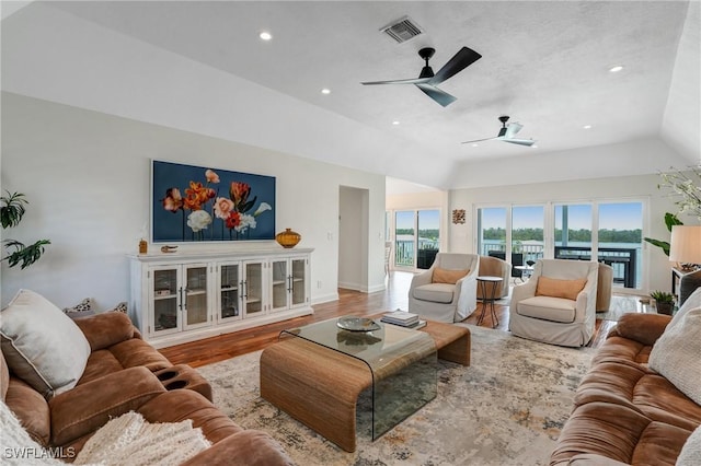 4031 Bayside Rd, Fort Myers Beach, FL 33931 - living area with lofted ceiling, a ceiling fan, recessed lighting, and wood finished floors