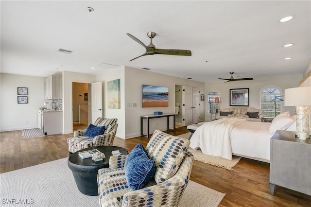 4031 Bayside Rd, Fort Myers Beach, FL 33931 - bedroom featuring wood finished floors, recessed lighting, and ceiling fan