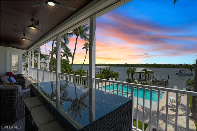 4031 Bayside Rd, Fort Myers Beach, FL 33931 - outdoor pool featuring ceiling fan and a water view