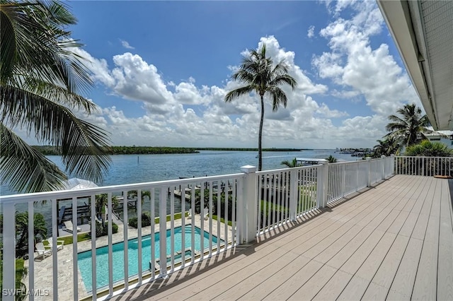 4031 Bayside Rd, Fort Myers Beach, FL 33931 - deck featuring a water view and an outdoor pool