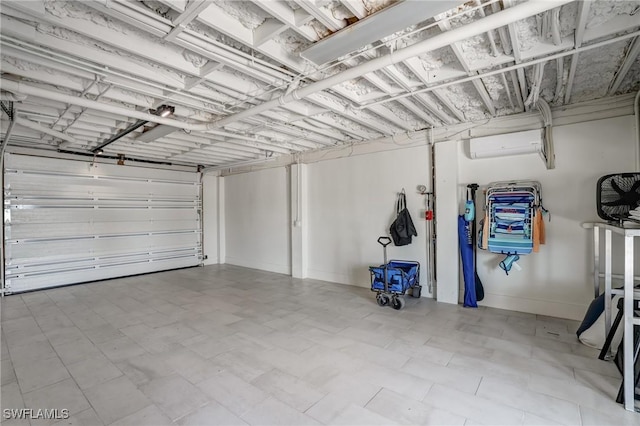 4031 Bayside Rd, Fort Myers Beach, FL 33931 - garage featuring baseboards and a wall unit AC