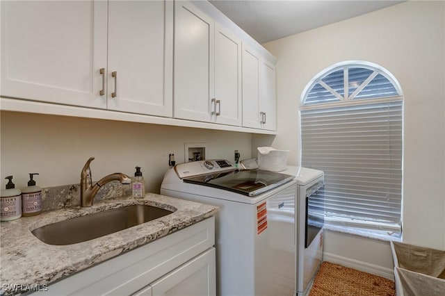 4031 Bayside Rd, Fort Myers Beach, FL 33931 - laundry area with separate washer and dryer and cabinet space