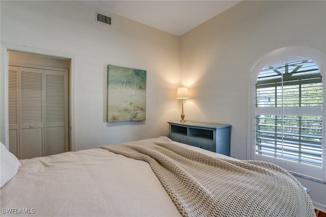 4031 Bayside Rd, Fort Myers Beach, FL 33931 - bedroom featuring arched walkways and a closet