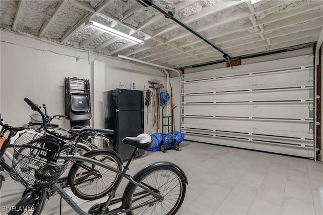 4031 Bayside Rd, Fort Myers Beach, FL 33931 - garage with freestanding refrigerator