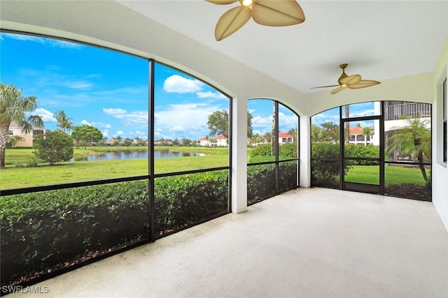 3165 Aviamar Cir Unit 102, Naples, FL 34114 - unfurnished sunroom with ceiling fan and a water view