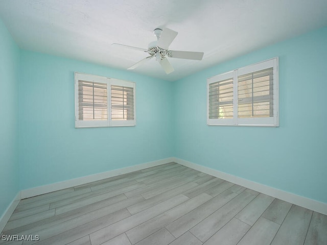 1486 13th Ave N, Naples, FL 34102 - spare room featuring wood finished floors and ceiling fan