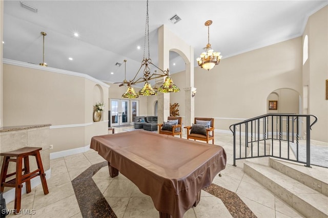 4007 Surfside Blvd, Cape Coral, FL 33914 - playroom featuring a chandelier, arched walkways, billiards, tile patterned flooring, and high vaulted ceiling