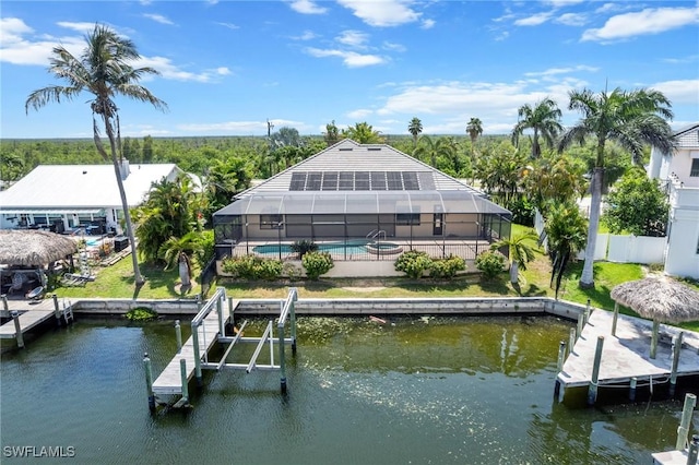 4007 Surfside Blvd, Cape Coral, FL 33914 - dock area with an outdoor pool, a water view, glass enclosure, and a patio