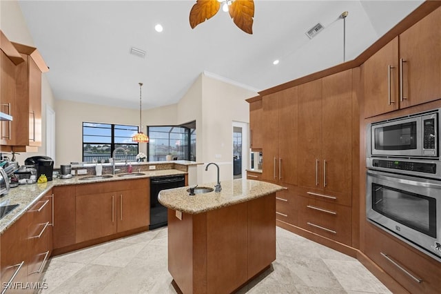 4007 Surfside Blvd, Cape Coral, FL 33914 - kitchen with appliances with stainless steel finishes, brown cabinetry, light stone counters, ceiling fan, and hanging light fixtures
