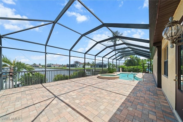 4007 Surfside Blvd, Cape Coral, FL 33914 - view of patio / terrace with a water view, a pool with connected hot tub, and glass enclosure