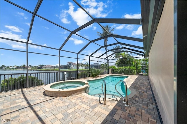 4007 Surfside Blvd, Cape Coral, FL 33914 - view of pool with a water view, a pool with connected hot tub, a patio area, and a lanai