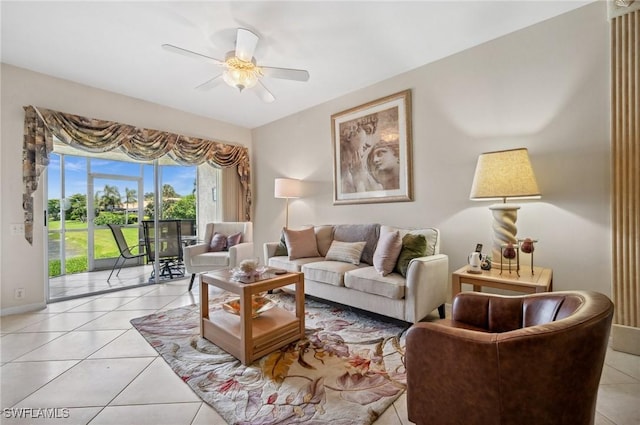 13090 Amberley Ct Unit 1103, Bonita Springs, FL 34135 - living room featuring a ceiling fan and light tile patterned floors