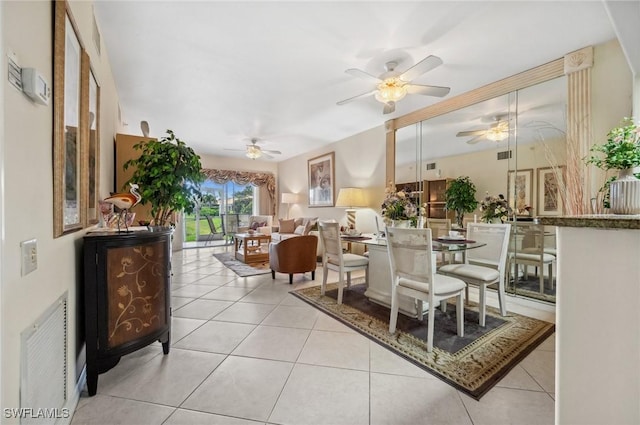 13090 Amberley Ct Unit 1103, Bonita Springs, FL 34135 - tiled dining room with a ceiling fan