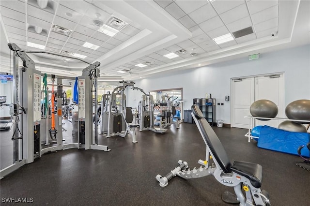 13090 Amberley Ct Unit 1103, Bonita Springs, FL 34135 - workout area with a drop ceiling and a raised ceiling