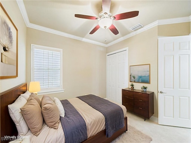 11217 Suffield St, Fort Myers, FL 33913 - bedroom with crown molding, a closet, a ceiling fan, and light carpet