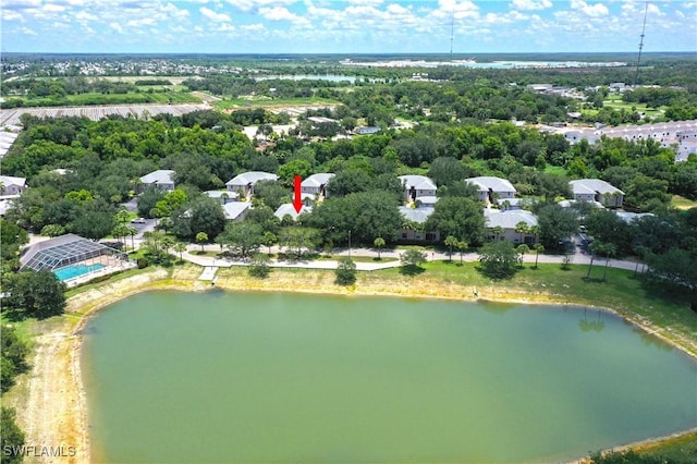 12330 Notting Hill Ln Unit 14, Bonita Springs, FL 34135 - bird's eye view of a large body of water and a tree filled landscape