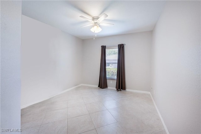 12330 Notting Hill Ln Unit 14, Bonita Springs, FL 34135 - empty room featuring ceiling fan and light tile patterned floors