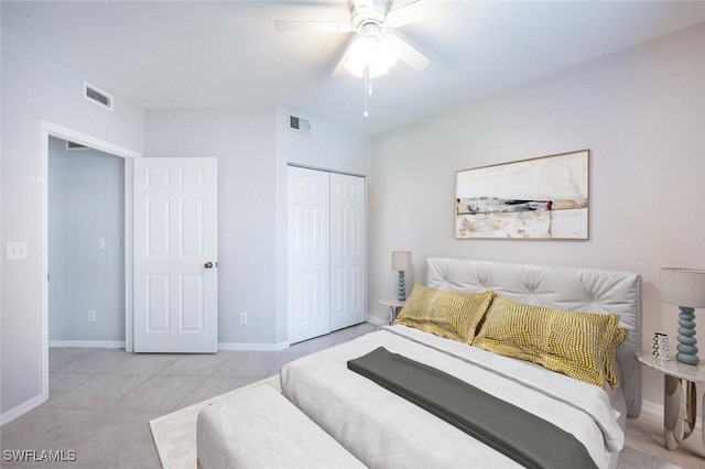 12330 Notting Hill Ln Unit 14, Bonita Springs, FL 34135 - bedroom featuring a closet, a ceiling fan, and tile patterned flooring