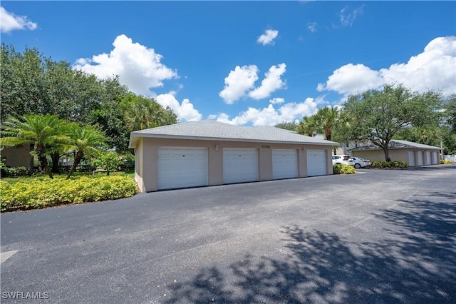 12330 Notting Hill Ln Unit 14, Bonita Springs, FL 34135 - view of garage