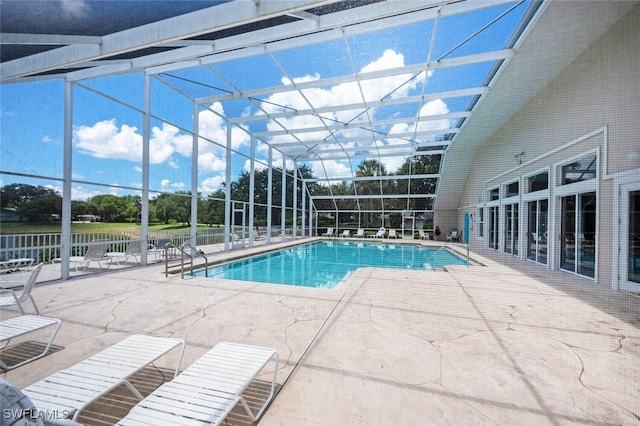 12330 Notting Hill Ln Unit 14, Bonita Springs, FL 34135 - community pool featuring a patio area and a lanai