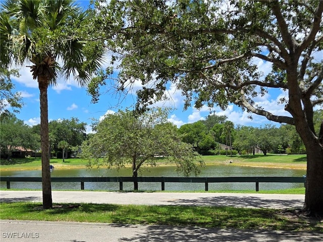 12330 Notting Hill Ln Unit 14, Bonita Springs, FL 34135 - view of home's community with a water view and view of scattered trees
